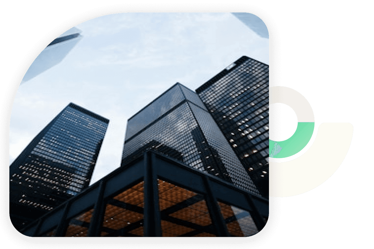 Upward view of modern glass skyscrapers against a cloudy sky, overlaid with abstract geometric design elements.